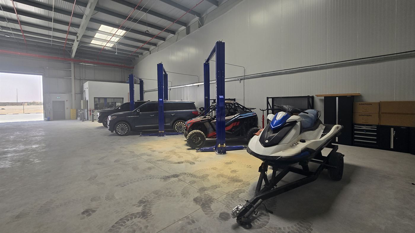 Jet ski on its trailer inside the Western Auto and Marine workshop