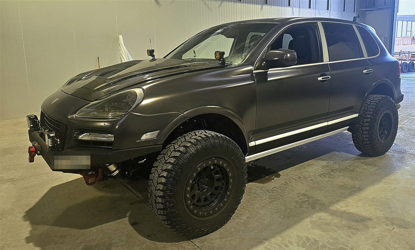 Lifted Porsche Cayenne offroad build on large all-terrain tyres and black wheels
