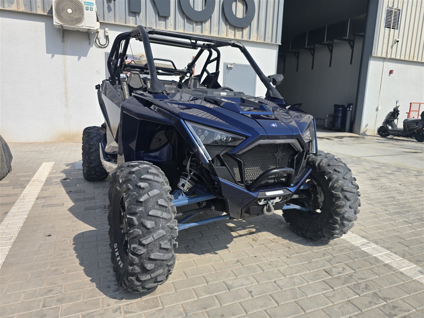 Blue Polaris RZR UTV serviced at Western Auto and Marine