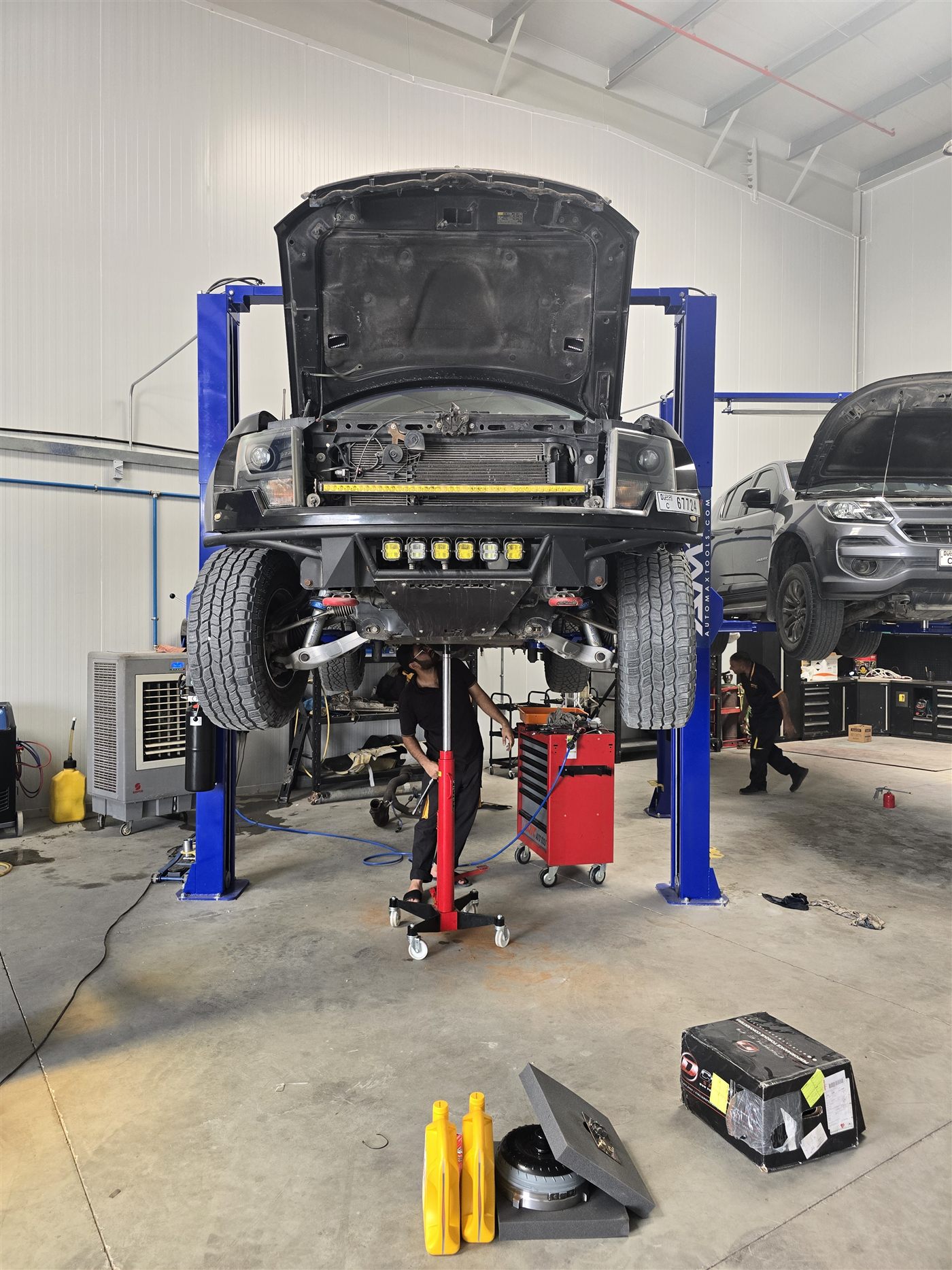 Truck on the lift being serviced at Western Auto and Marine